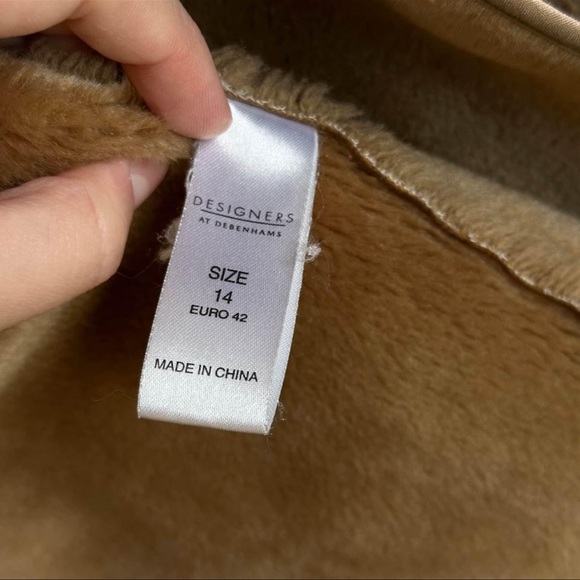 A sheepskin coat with natural sheep fur - Picture 5 of 9